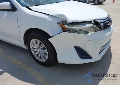 2014 Toyota Camry Le z USA, uszkodzony, nr VIN 4T1BF1FKXEU781661
